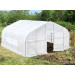 Serre de jardin avec ouvertures latérales 6x9x3m 180g/m² en situation
